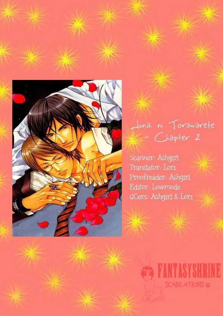 Junai ni Torawarete Chapter 2 page 1 - Chapter 2 : The Captive Man Part II